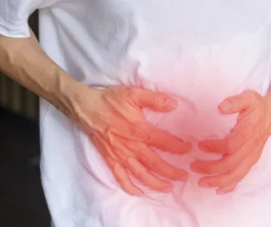 IBD patient holding stomach