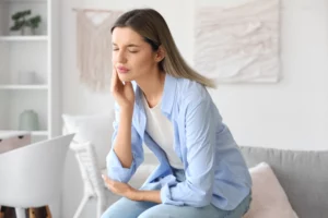 Woman with painful gums